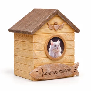 Cat house pet urn with fish-shaped memorial plaque and sample white cat portrait