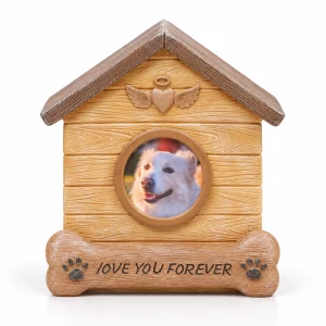 Front view of the dog house urn with a winged heart above the photo frame
