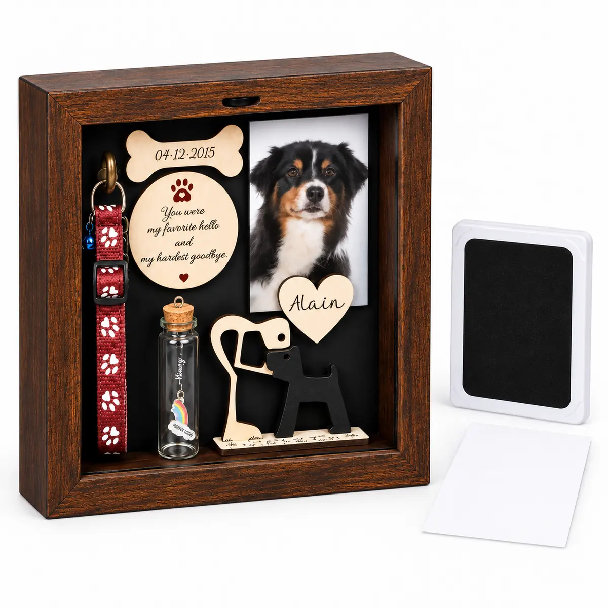 Dog memorial shadow box with paw impression kit viewed from a slight angle