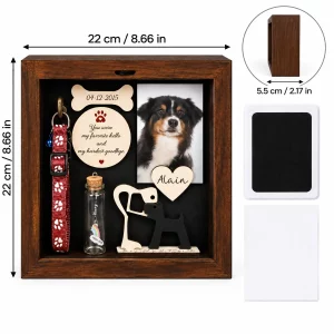 Dog memorial shadow box frame measures 22 by 22 by 5.5 cm, with paw impression kit beside it