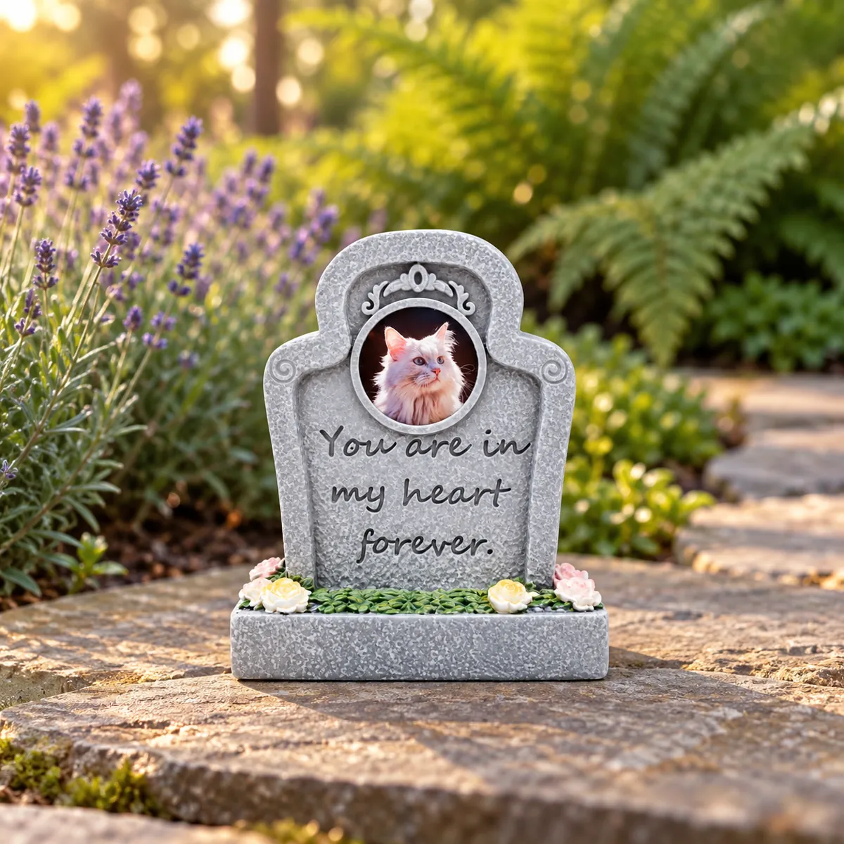 Forever in My Heart pet memorial plaque, on a flat stone beside a garden path, garden setting