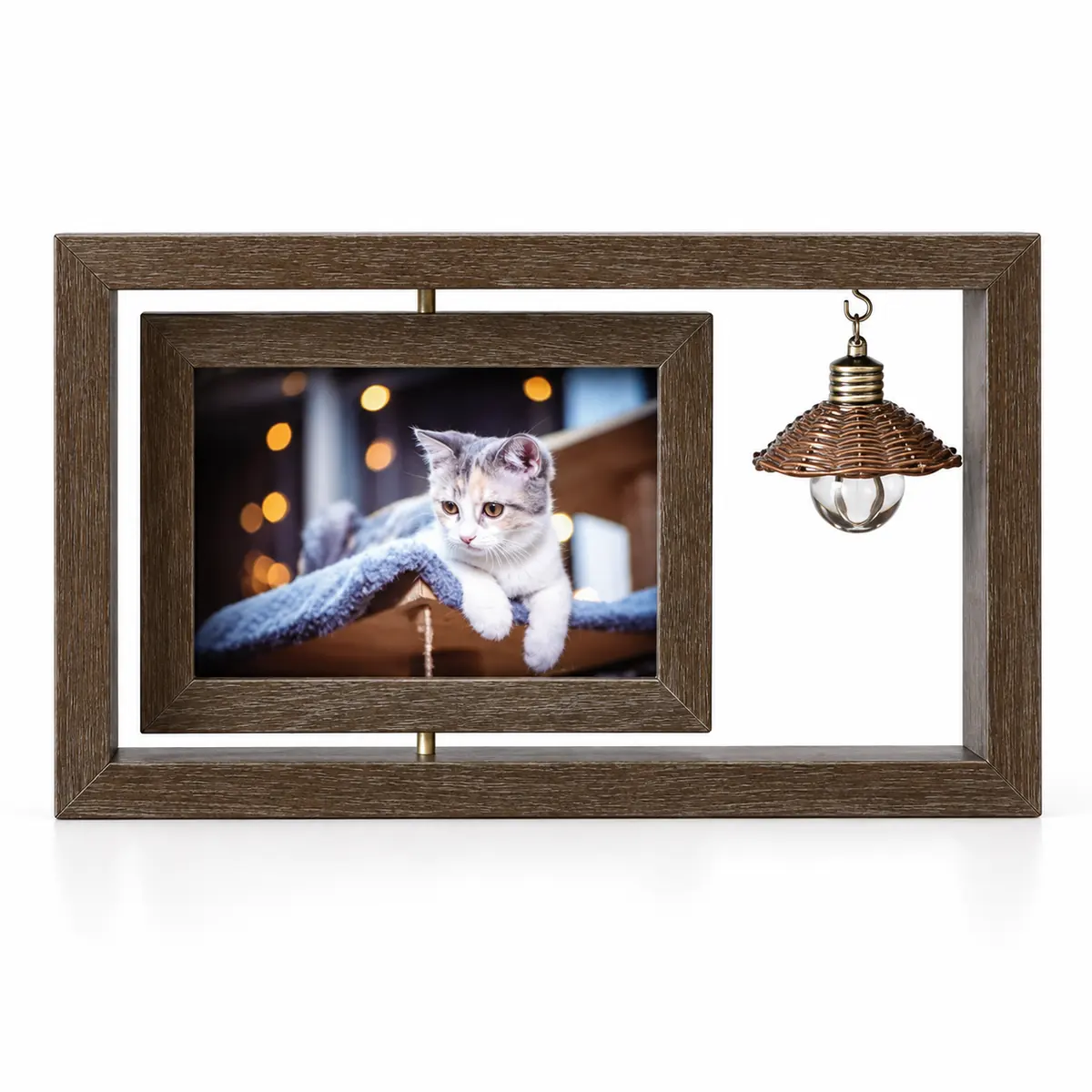 Dark open pet memorial frame with horizontal sample cat photo and decorative bulb