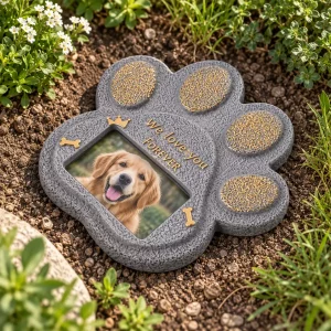 Paw Print Pet Grave Marker with Photo Window, in a remembrance garden