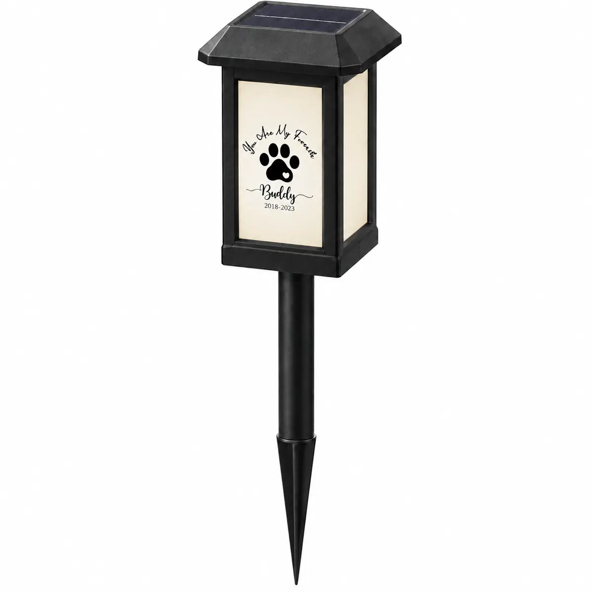 Paw-print solar pet memorial garden light from a slight angle with stake