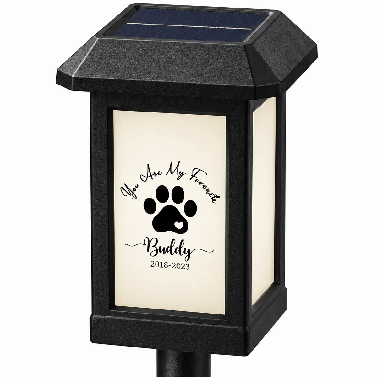 Close view of solar panel and sample paw-print memorial design on garden light
