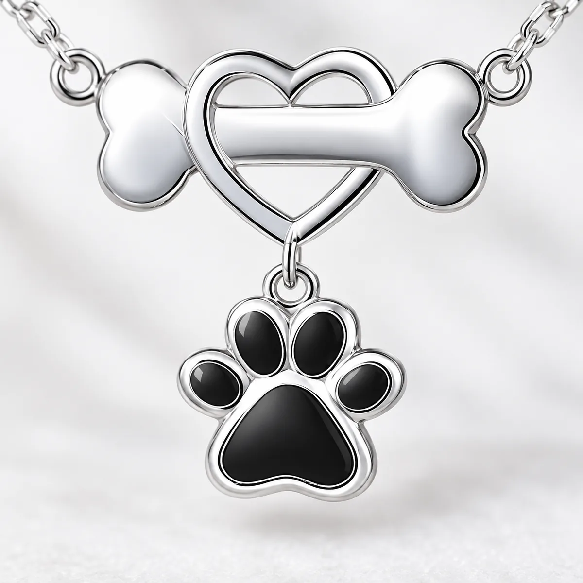 Sterling Silver Dog Bone Necklace with Heart and Paw, close-up detail
