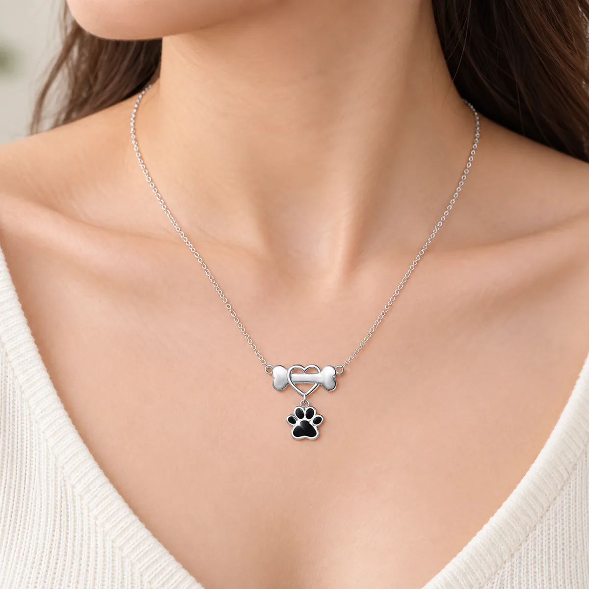 Sterling Silver Dog Bone Necklace with Heart and Paw, worn view