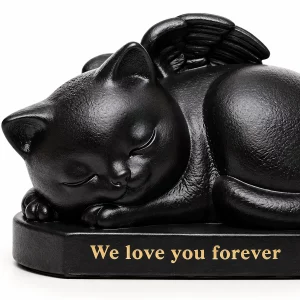 Close view of sleeping cat angel urn with peaceful face and We love you forever inscription