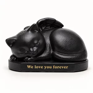 Black sleeping angel cat memorial urn sculpture with a wing and gold inscription